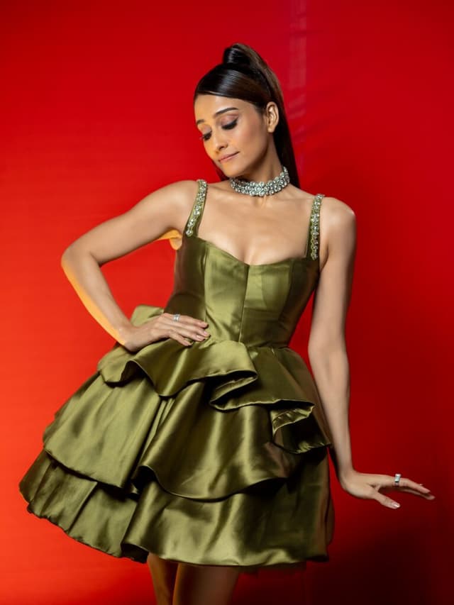 Regina Cassandra Turns Heads in Bright Green Mini Frock