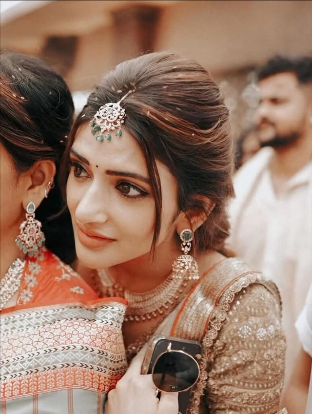 Sreeleela stuns in white lehenga at a family wedding!