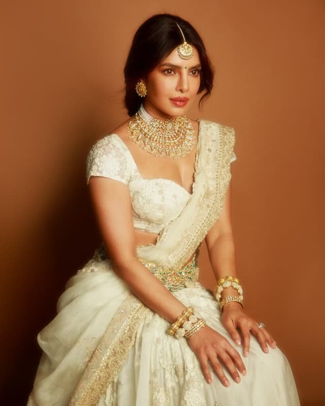 Cream Half Saree, Heavy Jewelry - Priyanka’s Look Steals the Night!