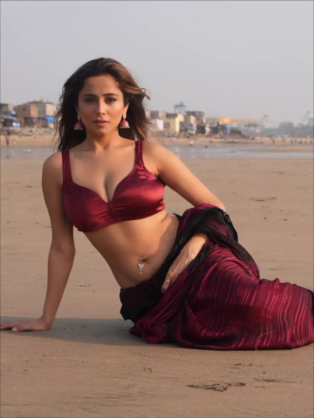 Kate Sharma Enchants the Shoreline: Maroon Saree Steals the Spotlight