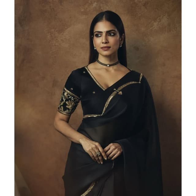 Malavika Mohanan Slays the Style Game in a Classic Black Saree