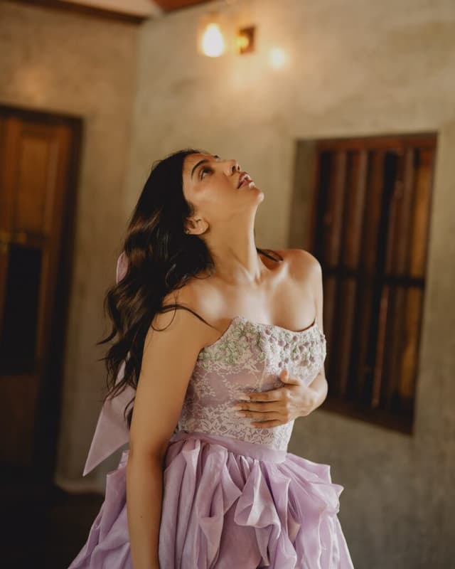 Madonna Sebastian Glows in Pastel Lilac Gown