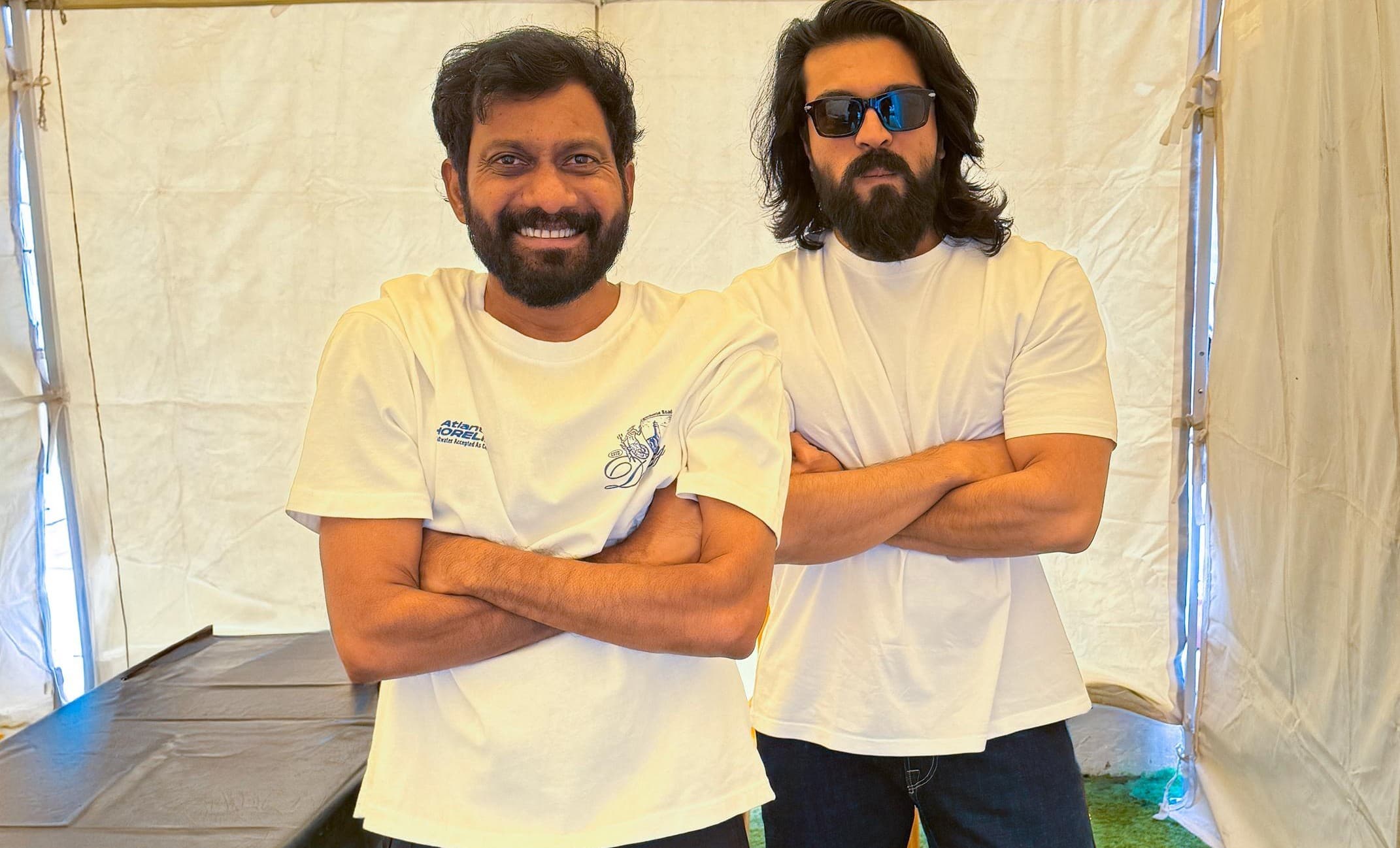 Buchi Babu Sana Shares Fun Moment with Ram Charan from Peddi Sets!