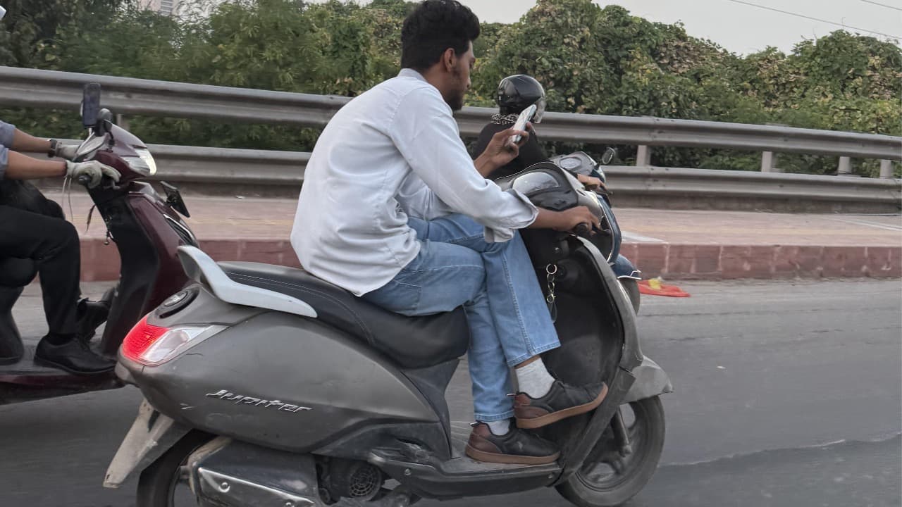 Reckless Riding with Phone Leads to Accident in Vijayawada!